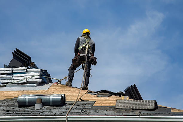 Professional Roof Replacement technician working in Mentone, CA